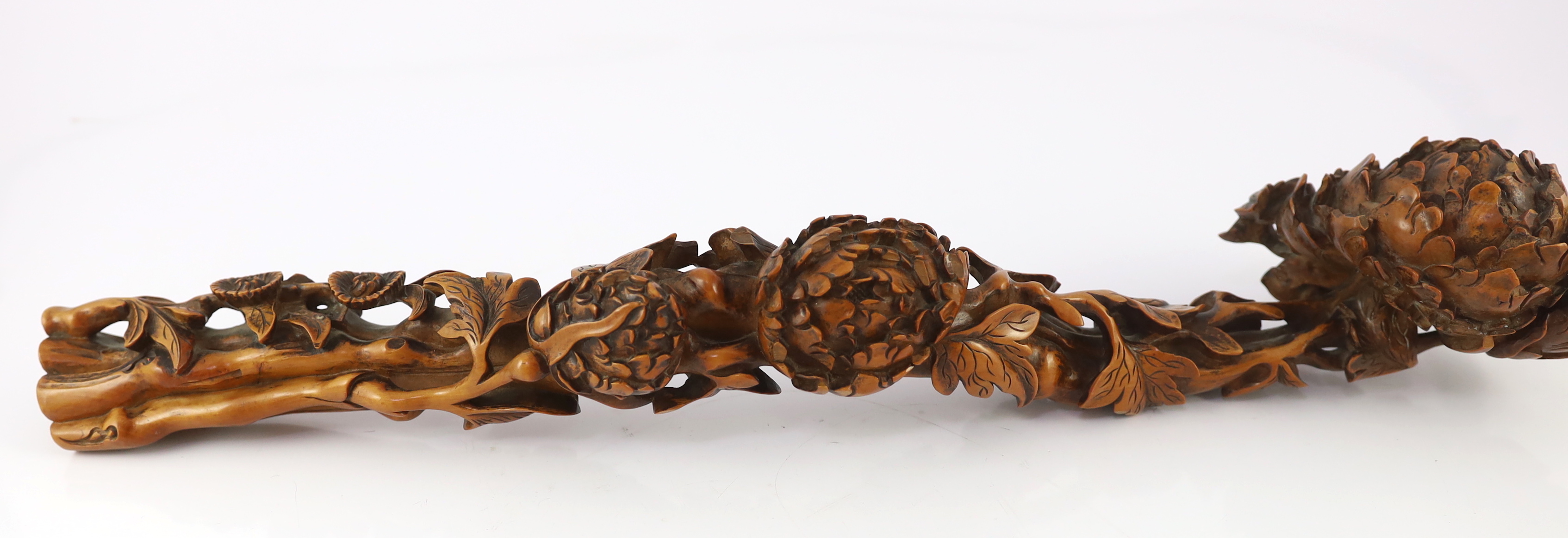 A Chinese boxwood ‘peony’ ruyi sceptre, 19th/20th century